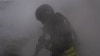 Ukraine -- Rescue workers fighting fire in Sumy region after a Russian strike, 15May2025 